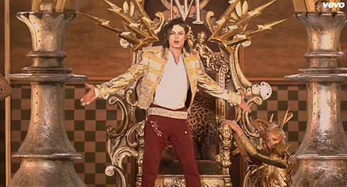Then things become extremely Masonic. The entire background behind MJ turns into a checkerboard pattern – as used on the ritualistic floor of Masonic lodges.